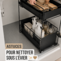 Evier de cuisine propre et bien organisé avec des produits de nettoyage